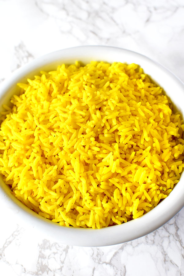 Yellow rice in a white bowl