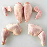 Thumbnail of a whole chicken cut up and laid out