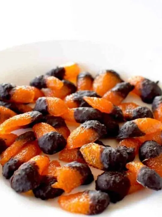 A pile of candied kumquats dipped in chocolate
