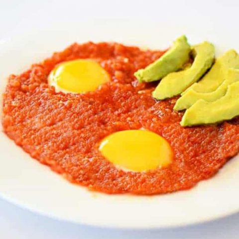 Huevos Rancheros with a side of avocado