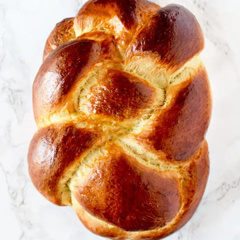 Challah bread on marble counter