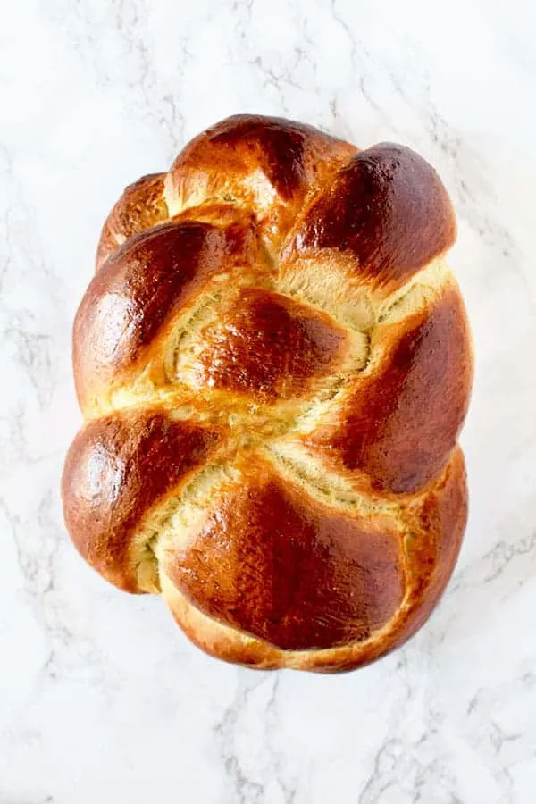 Challah bread on marble counter