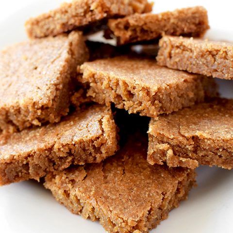 Blondies piled on a plate