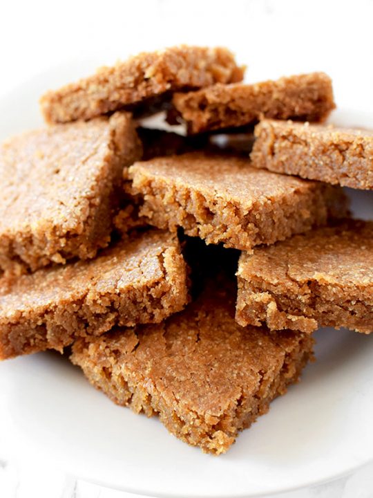 Blondies piled on a plate