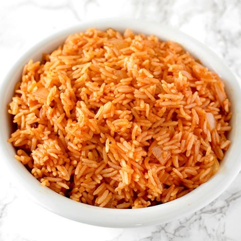 israeli red rice in a white bowl