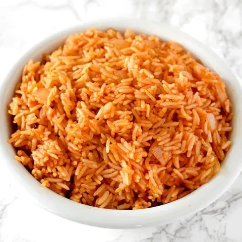 israeli red rice in a white bowl