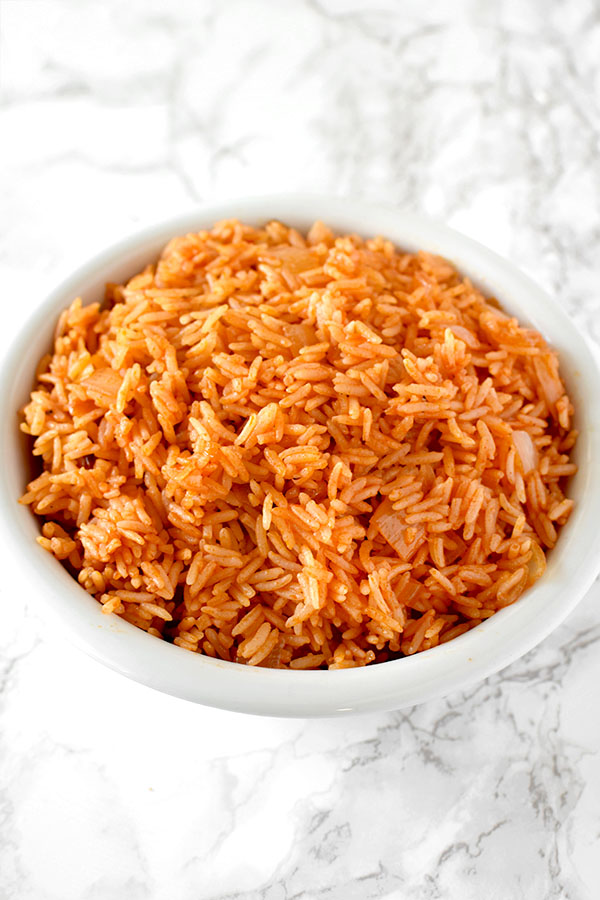 israeli red rice in a white bowl