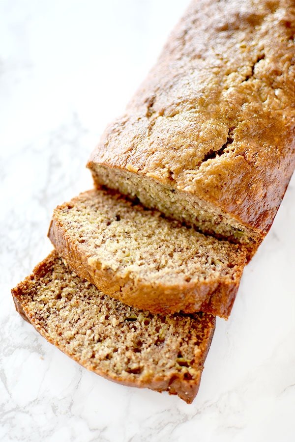 Sliced banana bread with oat milk