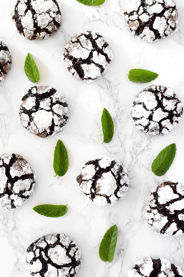 mint chocolate crinkle cookies with mint leaves