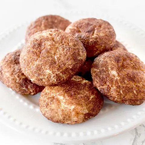 snickerdoodles piled on a plate