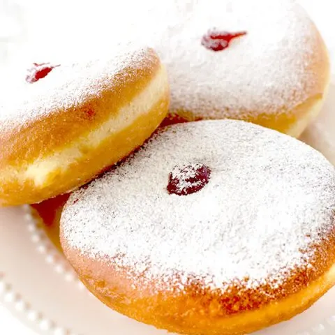 Sufganiyot on a white plate