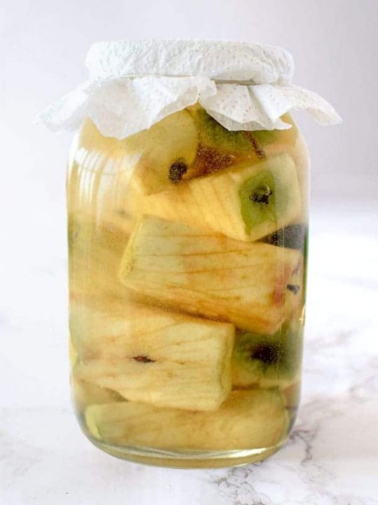 apple cores in a glass jar to make apple cider vinegar