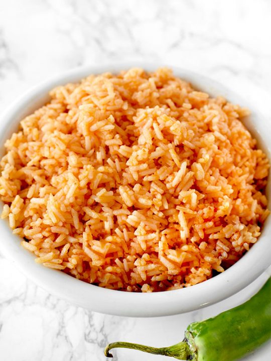 arroz rojo in a bowl on a marble counter