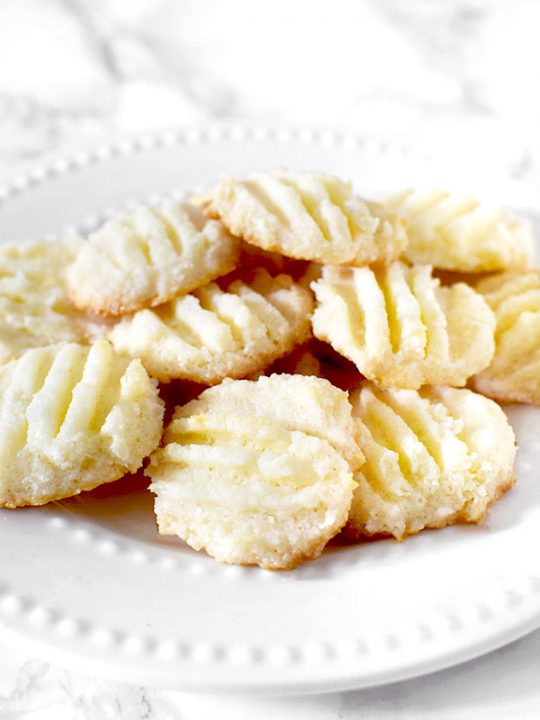 Biscoitos de Maizena or cornstarch cookies on a plate