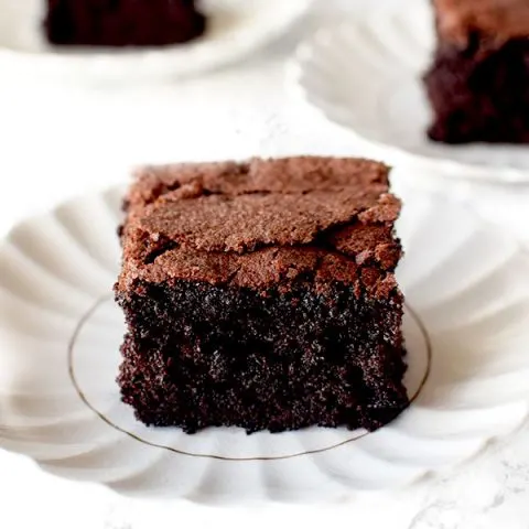 three slices of gluten Free Passover Chocolate Cake on white plates