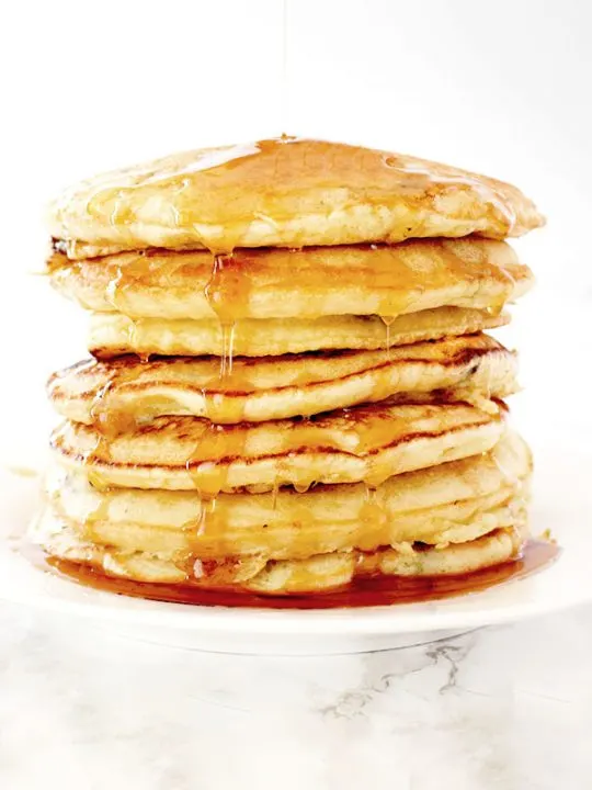 Pancakes stacked up on a plate