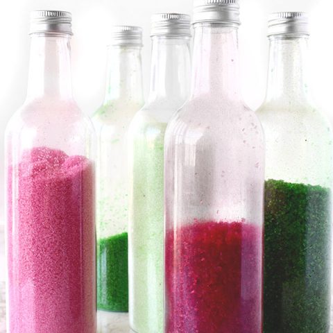 homemade colored sugar in bottles