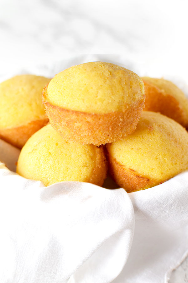 Southern cornbread muffins stacked in a bowl