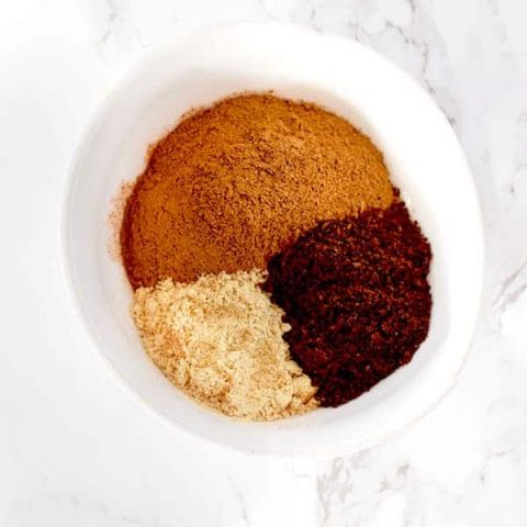 cinnamon, ginger, and cloves in a bow from pumpkin spice mix