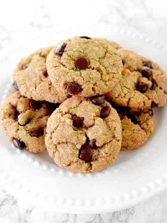 A pile of dairy free chocolate chip cookies on a plate