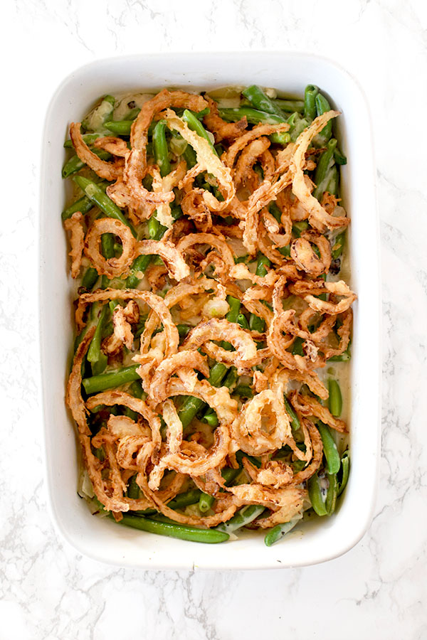 Dairy free green bean casserole on a white marble counter