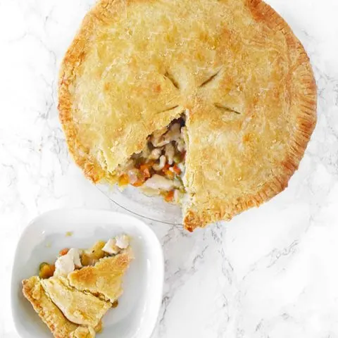 dairy free chicken pot pie with a slice on a plate