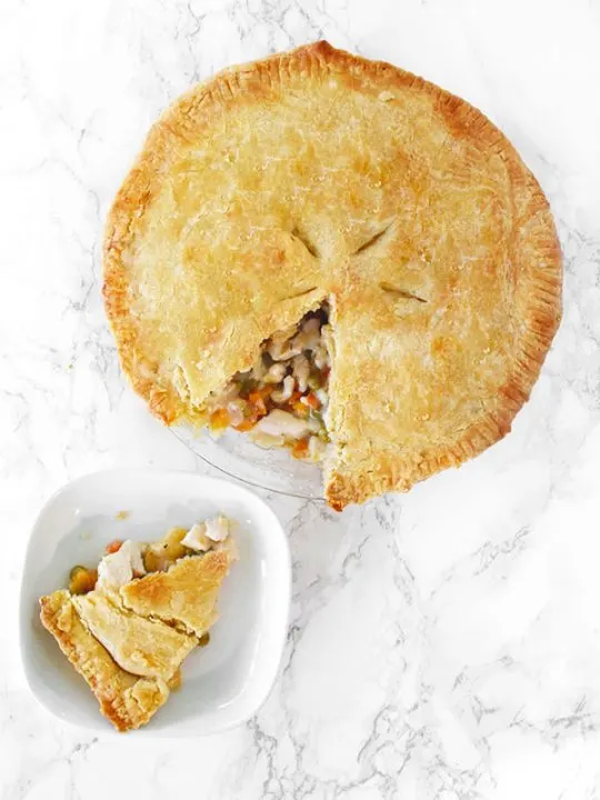 dairy free chicken pot pie with a slice on a plate