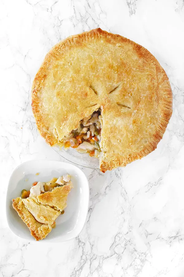 dairy free chicken pot pie with a slice on a plate