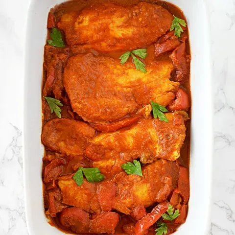 Moroccan fish in a white serving dish