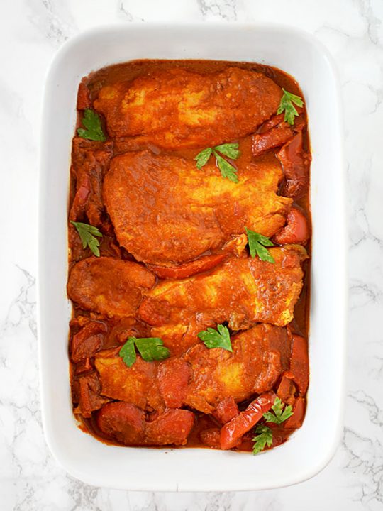 Moroccan fish in a white serving dish