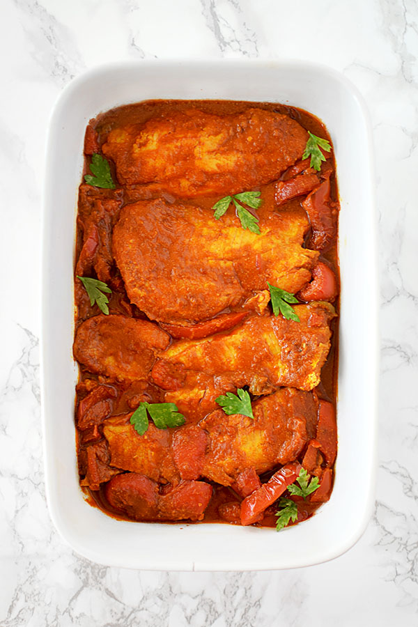 Moroccan fish in a white serving dish