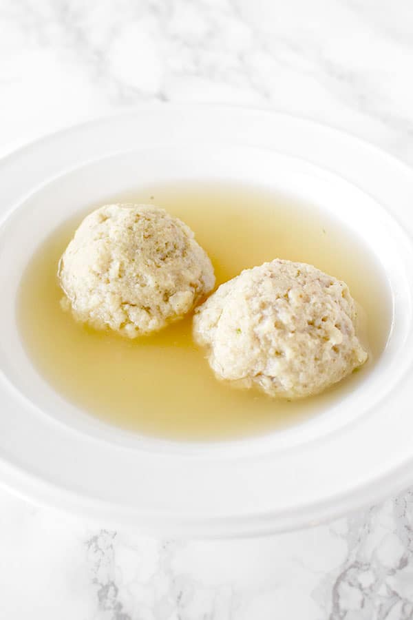 light and fluffy floater matzo balls in chicken soup