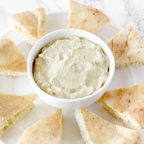 Baba Ghanoush on a plate with pita