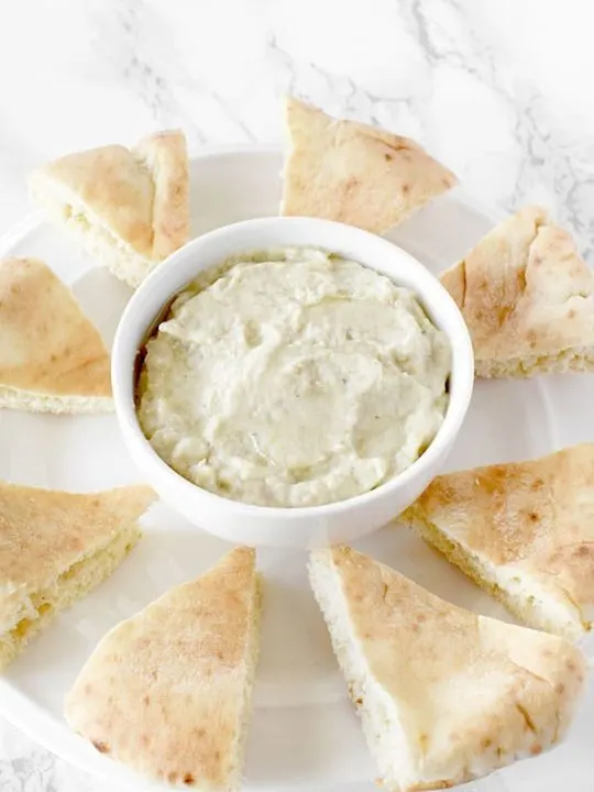 Baba Ghanoush on a plate with pita