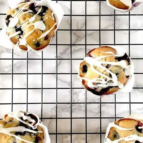 Blueberry Muffins with Lemon on a cooling rack