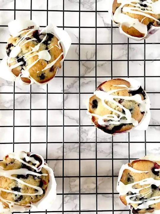 Blueberry Muffins with Lemon on a cooling rack