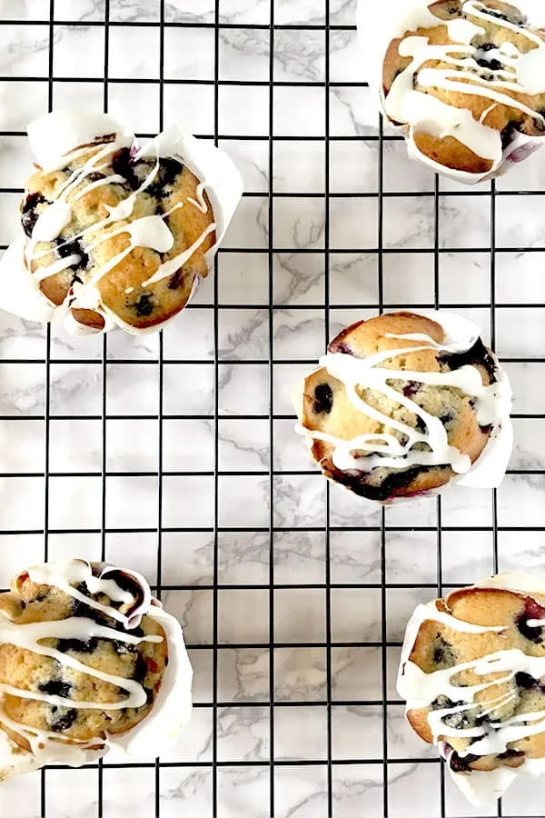 Blueberry Muffins with Lemon on a cooling rack