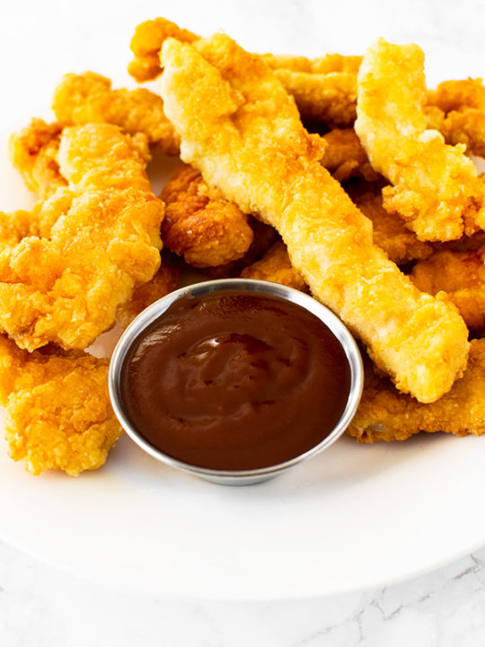 Fried Chicken Strips with ketchup on a plate