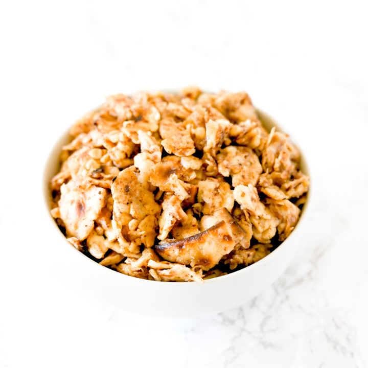 Sweet Matzo Brei in a white bowl on a white marble counter