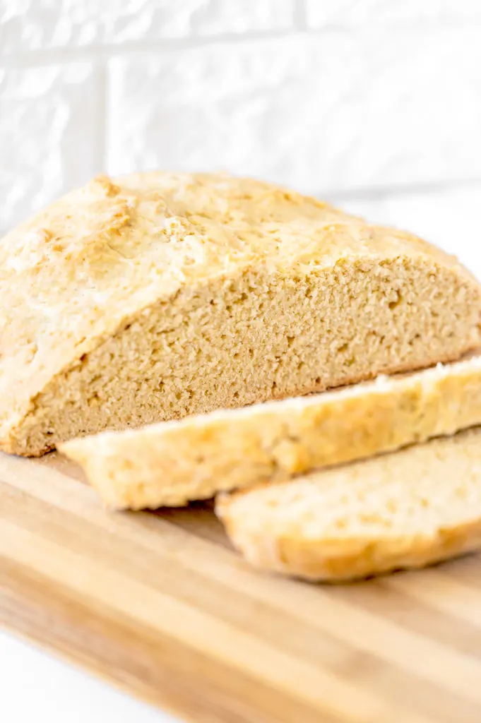 Irish soda bread with slices on a cutting board