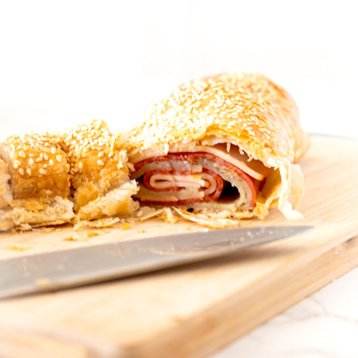 Deli roll cut on a cutting board