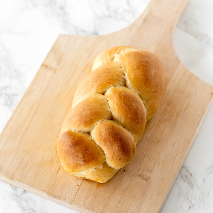 vegan challah bread on a cutting board