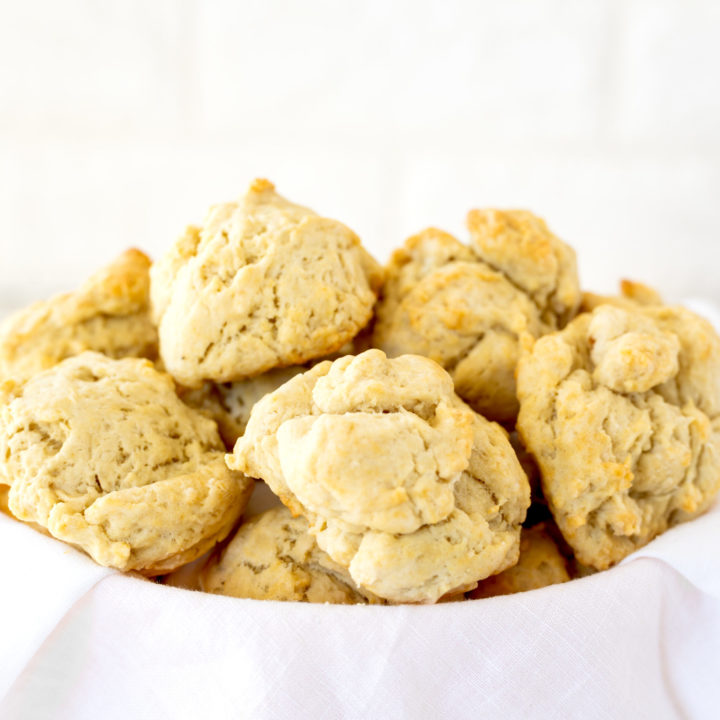 drop biscuits in a bowl with a white napkin