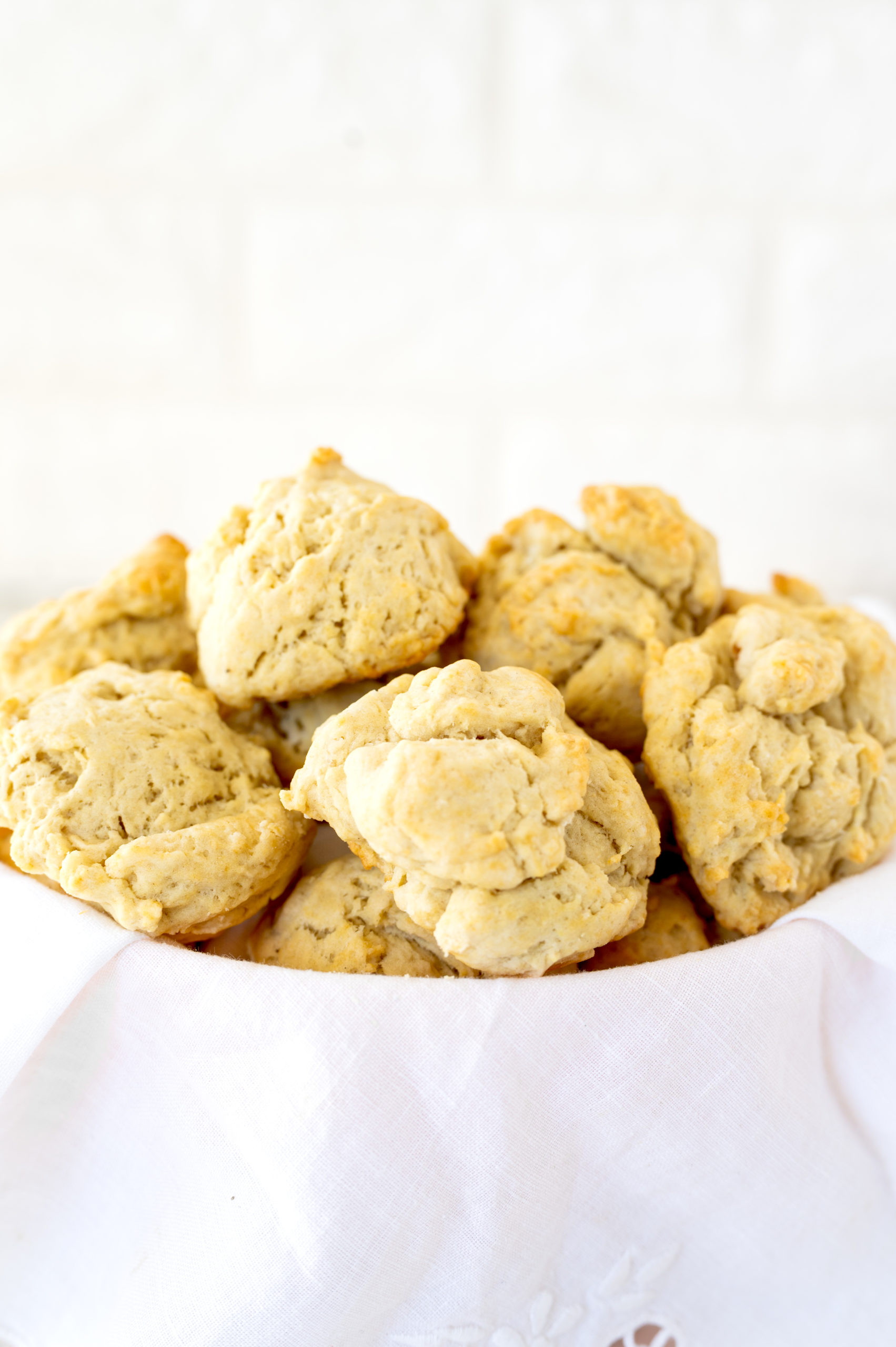 drop biscuits in a bowl with a white napkin